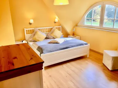 Ein Bett oder Betten in einem Zimmer der Unterkunft Straminke 4b Wohnung Dünentraum