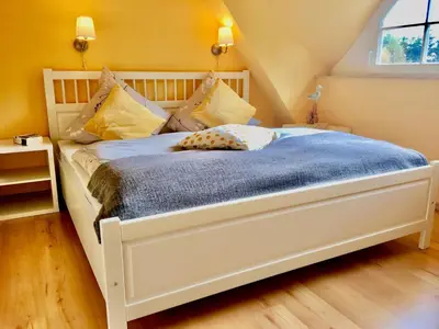 Ein Bett oder Betten in einem Zimmer der Unterkunft Straminke 4b Wohnung Dünentraum