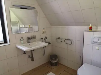 Ein Badezimmer in der Unterkunft Ferienwohnung Malvenhaus