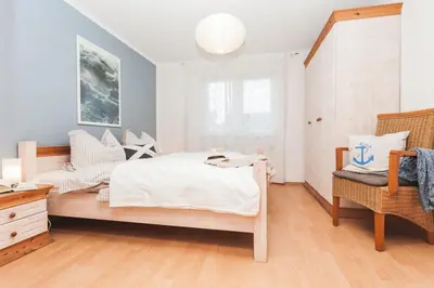 Ein Bett oder Betten in einem Zimmer der Unterkunft Prerower Strasse 14 Wohnung 1