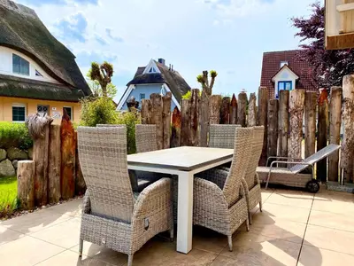 Ein Garten an der Unterkunft Mine-Heimat-Weg 18 Haus Dünenfee