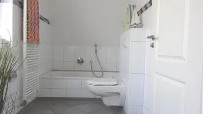Ein Badezimmer in der Unterkunft Mine-Heimat-Weg 18 Haus Dünenfee