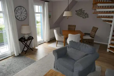 Ein Sitzbereich in der Unterkunft Boddenblick Wohnung 29