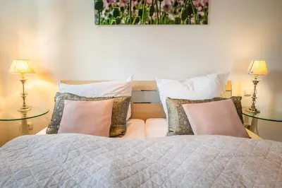 Ein Bett oder Betten in einem Zimmer der Unterkunft Alte Reihe 7 Strandelfe