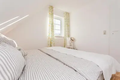 Ein Bett oder Betten in einem Zimmer der Unterkunft Bahnhofstraße 13 Wohnung 3