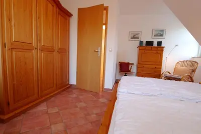 Ein Bett oder Betten in einem Zimmer der Unterkunft Kranichrast Haus 11