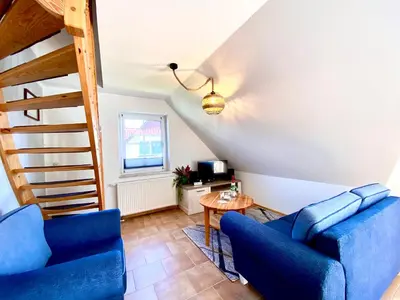 Ein Sitzbereich in der Unterkunft Hägerende 66a Haus Ankerplatz Wohnung Oberdeck