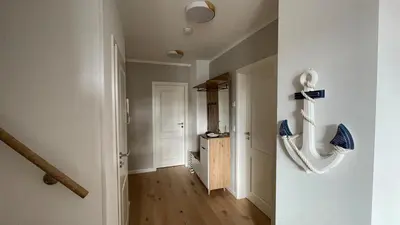 Küche/Küchenzeile in der Unterkunft Neue Reihe 1 Wohnung 3 