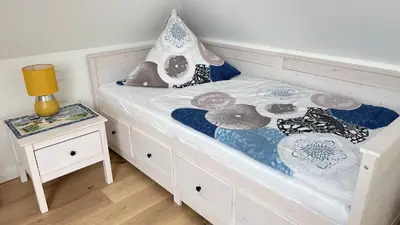 Ein Bett oder Betten in einem Zimmer der Unterkunft Neue Reihe 1 Wohnung 3 