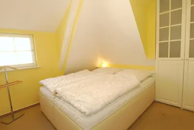 Ein Bett oder Betten in einem Zimmer der Unterkunft Müggenburger Weg 35 Wohnung oben links
