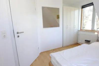 Ein Bett oder Betten in einem Zimmer der Unterkunft Haus Kiek Över 9