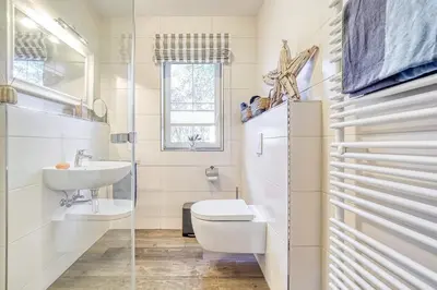 Ein Badezimmer in der Unterkunft Strandwiese 12 Haus Strandgut