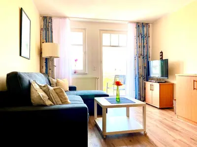 Ein Sitzbereich in der Unterkunft Boddenblick Wohnung 16