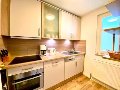 Küche/Küchenzeile in der Unterkunft Boddenblick Wohnung 16