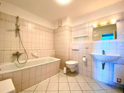 Ein Badezimmer in der Unterkunft Boddenblick Wohnung 16