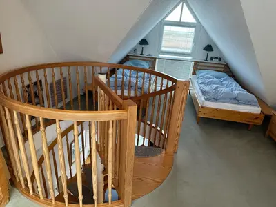 Ein Bett oder Betten in einem Zimmer der Unterkunft Boddenblick Wohnung 28