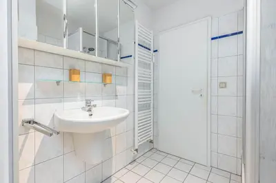 Ein Badezimmer in der Unterkunft Störtebekerstrasse 14 Wohnung 9