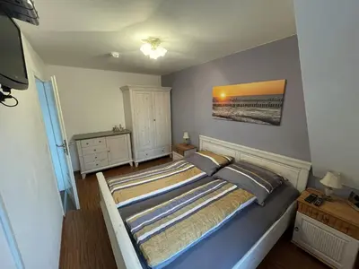 Ein Bett oder Betten in einem Zimmer der Unterkunft Birkenstraße 5g Wohnung Sola Bona