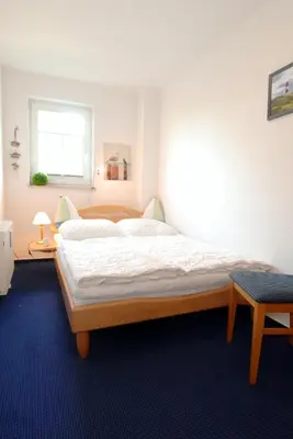 Ein Bett oder Betten in einem Zimmer der Unterkunft Hafenstrasse 22 Wohnung 1