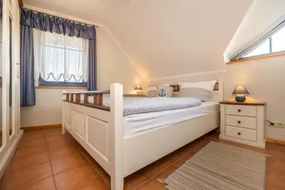 Ein Bett oder Betten in einem Zimmer der Unterkunft Neue Reihe 40 Haus Sonnenhof