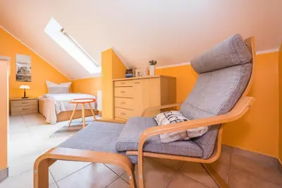 Ein Sitzbereich in der Unterkunft Börlingstrasse 14b Haus 14b