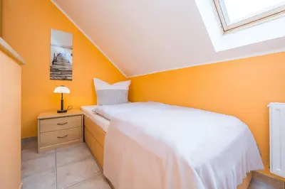 Ein Bett oder Betten in einem Zimmer der Unterkunft Börlingstrasse 14b Haus 14b