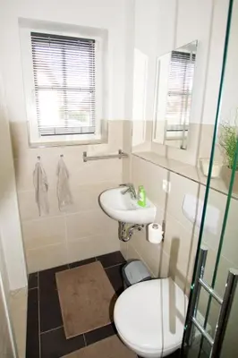 Ein Badezimmer in der Unterkunft Mühlenstrasse 4a Haus Boddenkoje