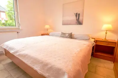 Ein Bett oder Betten in einem Zimmer der Unterkunft Birkenstraße 11a Wohnung 3