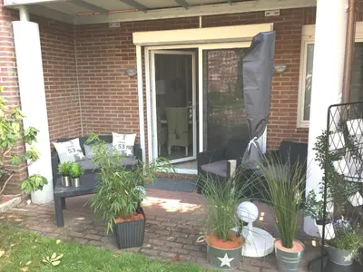 Ein Garten an der Unterkunft Birkenstraße 11a Wohnung 3