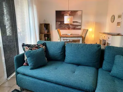 Ein Sitzbereich in der Unterkunft Birkenstraße 11a Wohnung 3