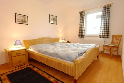 Ein Bett oder Betten in einem Zimmer der Unterkunft Birkenstraße 15b Wohnung 11