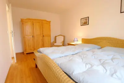 Ein Bett oder Betten in einem Zimmer der Unterkunft Birkenstraße 15b Wohnung 11