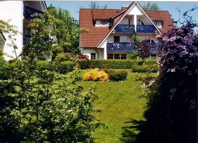 Ein Garten an der Unterkunft Birkenstraße 15b Wohnung 11