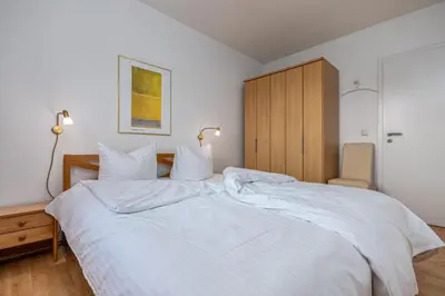 Ein Bett oder Betten in einem Zimmer der Unterkunft Glebbe 17 Wohnung 2