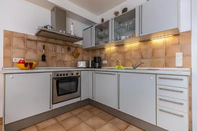 Küche/Küchenzeile in der Unterkunft Glebbe 17 Wohnung 2