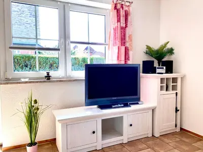 TV/Unterhaltungsangebot in der Unterkunft Hägerende 66a Haus Ankerplatz Wohnung Bootsdeck