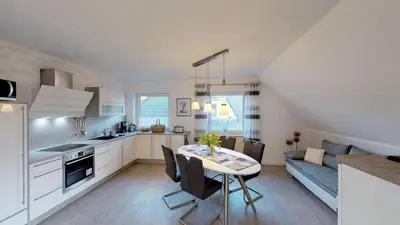 Küche/Küchenzeile in der Unterkunft Wohnung Darßer Weg 10a