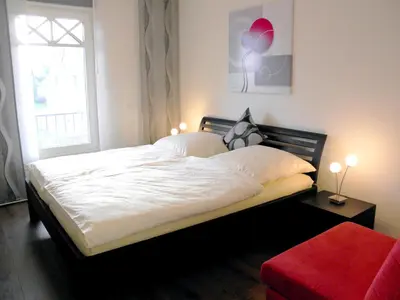 Ein Bett oder Betten in einem Zimmer der Unterkunft Lindenstrasse 6 Wohnung 4