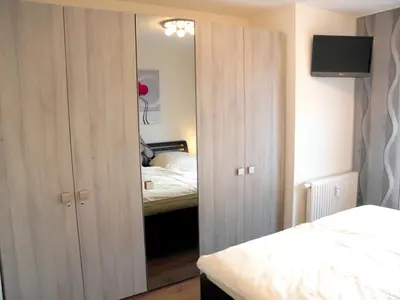 Ein Bett oder Betten in einem Zimmer der Unterkunft Lindenstrasse 6 Wohnung 4