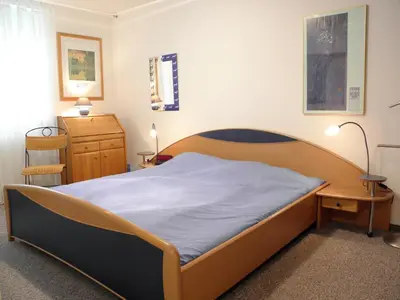 Ein Bett oder Betten in einem Zimmer der Unterkunft Birkenstrasse 06i Wohnung 4