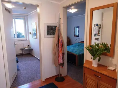 Ein Bett oder Betten in einem Zimmer der Unterkunft Birkenstrasse 06i Wohnung 4