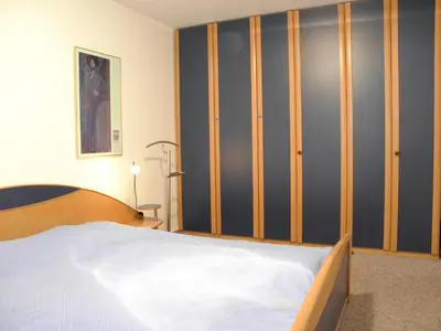 Ein Bett oder Betten in einem Zimmer der Unterkunft Birkenstrasse 06i Wohnung 4