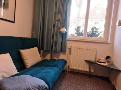 Ein Sitzbereich in der Unterkunft Birkenstrasse 06i Wohnung 4