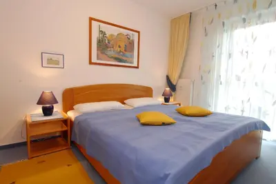 Ein Bett oder Betten in einem Zimmer der Unterkunft Klosterstrasse 14b Wohnung 5