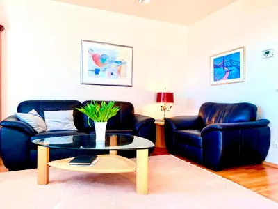 Ein Sitzbereich in der Unterkunft Boddenkieker Wohnung 20