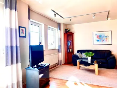 Ein Sitzbereich in der Unterkunft Boddenkieker Wohnung 20