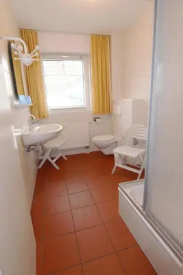 Ein Sitzbereich in der Unterkunft Boddenkieker Wohnung 22