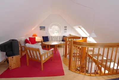 Ein Sitzbereich in der Unterkunft Boddenkieker Wohnung 22