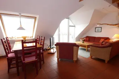 Ein Sitzbereich in der Unterkunft Boddenkieker Wohnung 22