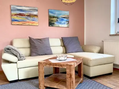 Ein Sitzbereich in der Unterkunft Hägerende 66a Haus Ankerplatz Wohnung Brückendeck